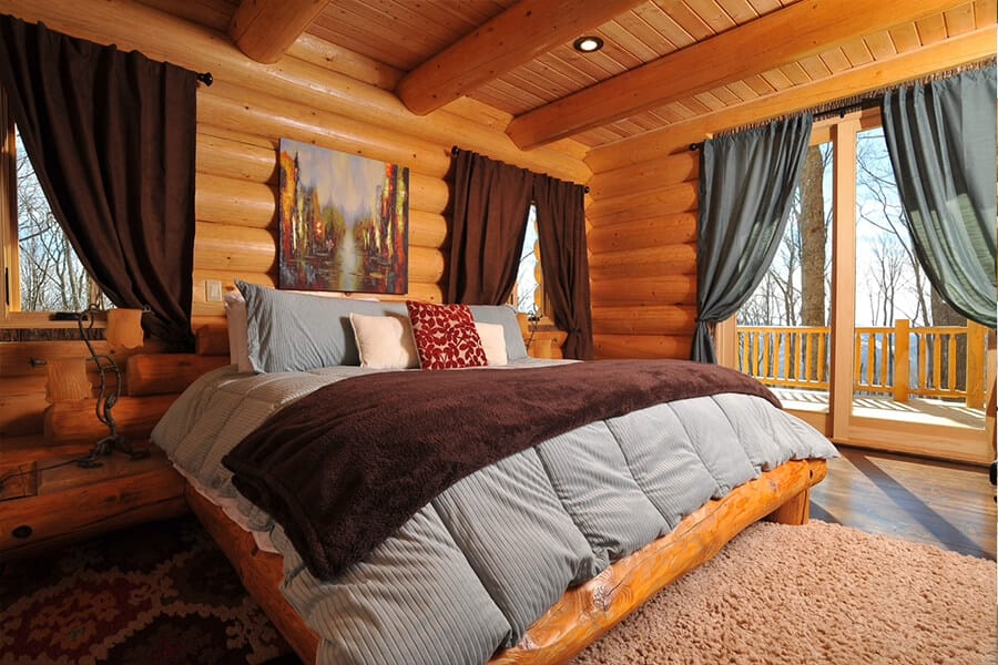Milled Log Home Bedroom
