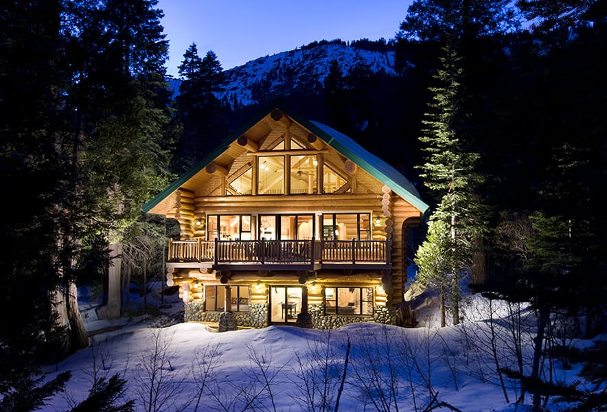 Log home from rear at night